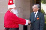 Supervisor Delgaudio walked Santa Claus out of the Leesburg GovernmentBuilding after his historic visit to warn the Board of Supervisors toleave the lights on for Christmas and to also leave all of Loudoun'sLights alone.