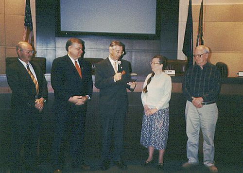 Helen Casey receives her resolution of commendation at the Board of supervisors meeting.
Left to right: Supervisor Clem, Chairman York, Supervisor Delgaudio, Helen Casey, and Mr. Casey.