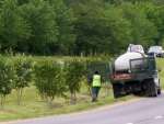 This water truck will make periodic visits to keep the trees watered.