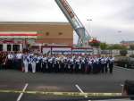 Park View HS Band poses with volunteer firemen at Chick-Fil-A event to honor Sterling's Heroes and the heroes of 9-11 in New York. 